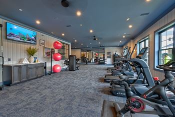 A gym with exercise bikes 